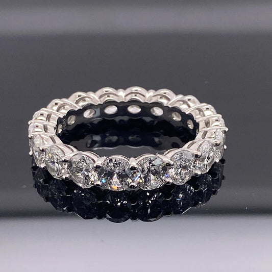 Timeless Elegance: The 5.52 Carat Oval Cut G.I.A. Certified Diamond Eternity Band